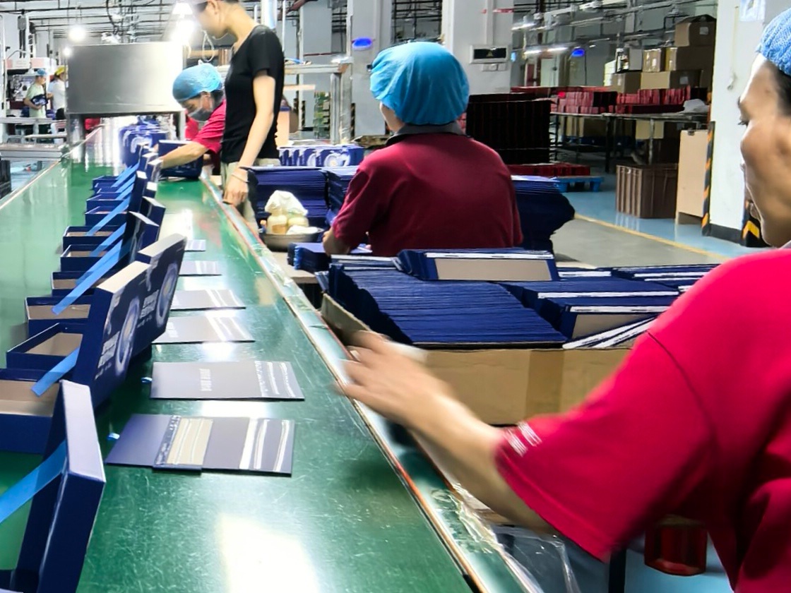 Precision forming and surface wrapping process for custom rigid boxes